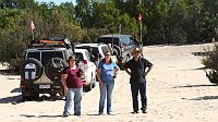 21-Carol, Karen & Vince watch one of our convoy climb Ross Springs dune